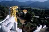 Travel photography:Guardian overlooking a valley near Chiang Rai, Thailand