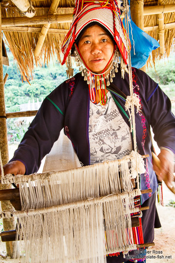 Woman with her loom at the Ban Lorcha Akha village