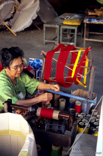 Making the thread for the parasols at the Bo Sang parasol factory