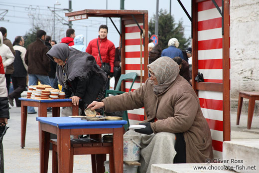 Selling pigeon food outside the Yeni Mosque in Istanbul