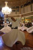 Travel photography:Derwish dancers at the Mevlevi convent in Galata, Turkey