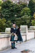 Travel photography:Edinburgh man playing the bagpipes, United Kingdom