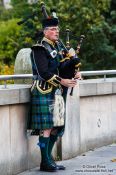 Travel photography:Edinburgh man playing the bagpipes, United Kingdom