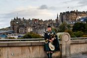 Travel photography:Edinburgh man playing the bagpipes, United Kingdom