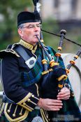 Travel photography:Edinburgh man playing the bagpipes, United Kingdom