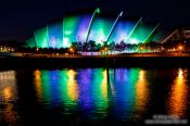 Travel photography:The Glasgow Clyde Auditorium illuminated by night, United Kingdom