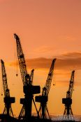 Travel photography:Glasgow Dock Cranes at sunset, United Kingdom