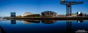 Travel photography:Panoramic image of the River Clyde with Auditorium and crane, United Kingdom