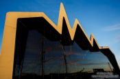 Travel photography:The Glasgow Riverside Museum at sunset with reflection of the Tall Ship Glenlee, United Kingdom
