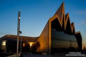 Travel photography:The Glasgow Riverside Museum at sunset with reflection of the Tall Ship Glenlee, United Kingdom