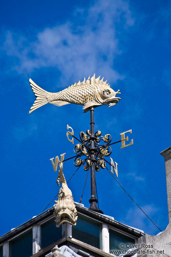 Golden fish weather vane in London