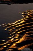 Travel photography:Ripples in the sand at Highcliff Beach, United Kingdom