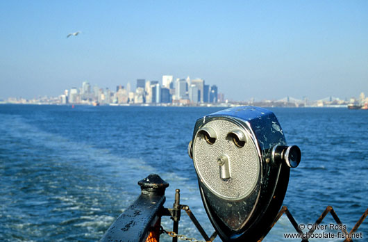 Looking glass on the Staten Island ferry with New York City skyline