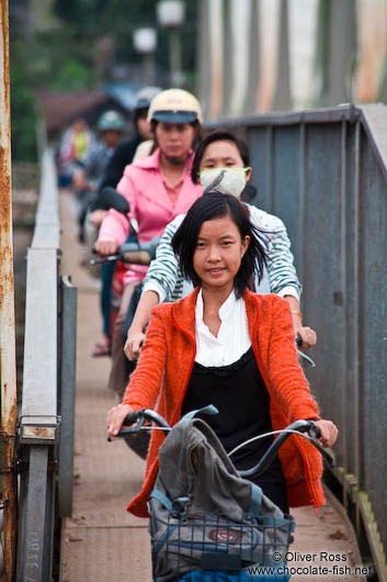 Hue girl on bike 