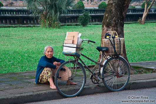 Hue woman with bike