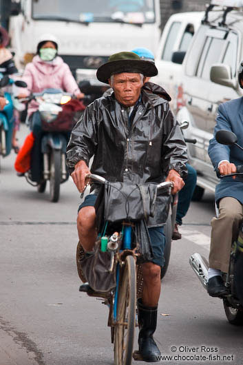 Hue man on bike 