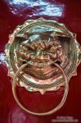 Travel photography:Brass door knob at a Chinese assembly hall in Hoi An, Vietnam