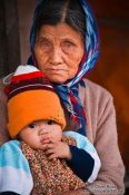 Travel photography:Hoi An grandmother with baby , Vietnam