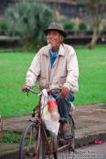Travel photography:Hue man on bike , Vietnam