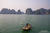 Travel photography:Fishing boat in Halong Bay , Vietnam