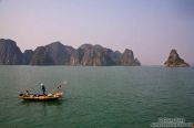 Travel photography:Fishing boat in Halong Bay , Vietnam