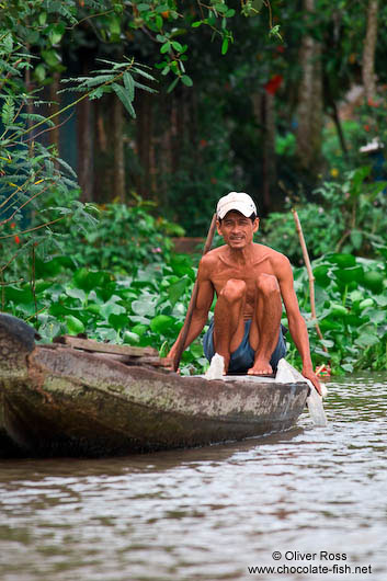 Man on boat in Can Tho 