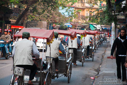 Line of cycle rickshas in Hanoi
