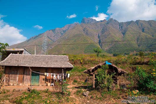 Houses near Sapa with Fansipan mountain in the background