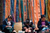 Travel photography:Hmong girls doing handy work in Sapa, Vietnam