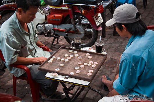 Two men playing in Hoh Chi Minh City