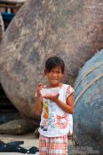 Travel photography:Girl with rice bowl in Mui Ne , Vietnam