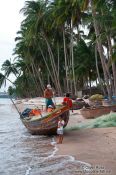 Travel photography:Fisherman preparing the net at Mui Ne , Vietnam