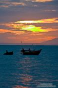 Travel photography:Sunset over the ocean at Mui Ne, Vietnam